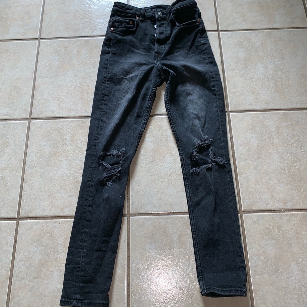 Black ripped high waisted jeans.